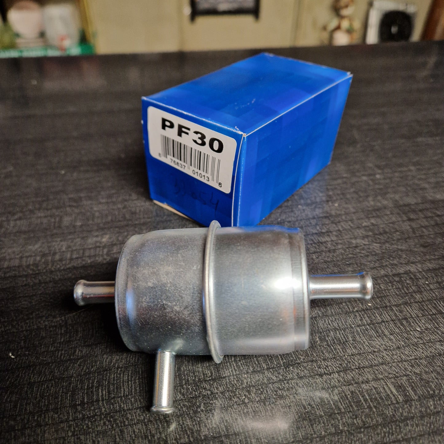 Bränslefilter med returrör på sidan. Metallhölje för 5/16" slang. Chrysler, MoPar PF30 (33054)